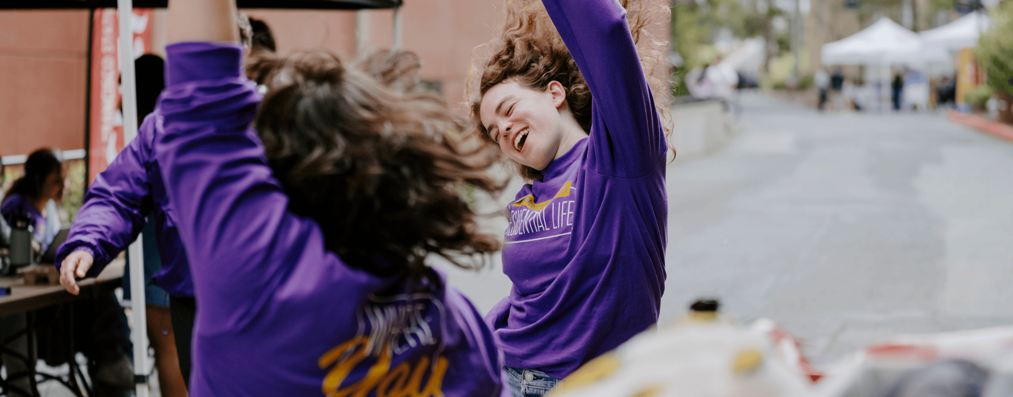 SFSU Residential Life team celebrates with a dance